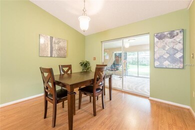 DINING AREA with sliding doors to FLORIDA ROOM.