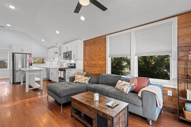 Living area featuring wood-type flooring, visible