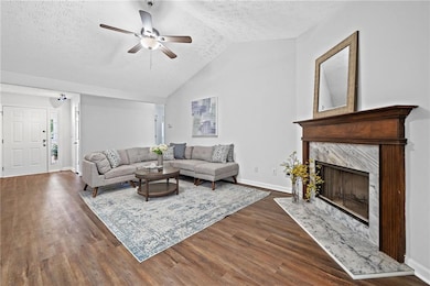 Large Vaulted living room with fireplace
