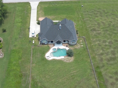 2 ACRES WITH A FENCED BACK YARD