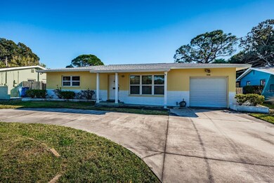 Front view with circular driveway