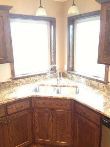 Corner sink with double windows