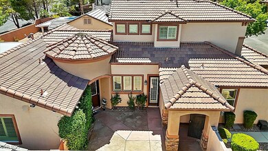 Move-in-ready home courtyard with dual entrances,