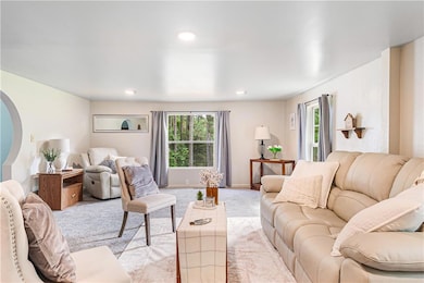 Living room featuring plenty of natural light, rec