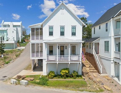 Lake home with a multiple screened in porches, boa