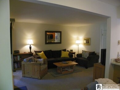 Living room, complete with a wood burning fireplac