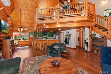 Main floor view of the kitchen, dining room and upper level