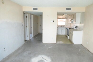 living area to kitchen
