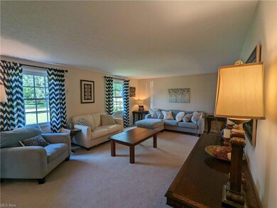Spacious Living Room with Sun-soaked Windows