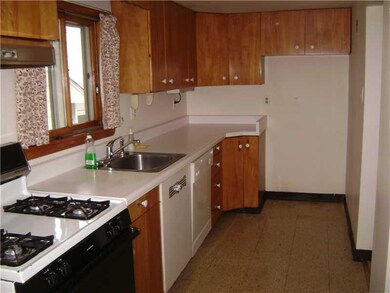 Kitchen. Long galley kitchen with single sink with