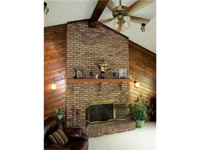 Family Room. The brick gas fireplace is the focal 