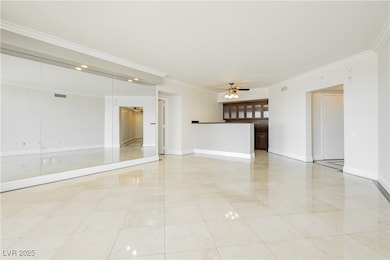 Unfurnished room featuring crown molding, a ceilin