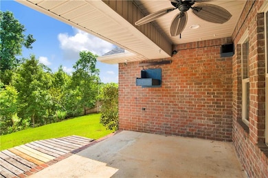 View of patio / terrace with a ceiling fan