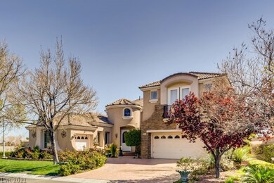 Exterior front with 3 car garage