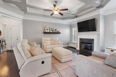 Floating wooden shelf in the living room does not convey with the property.