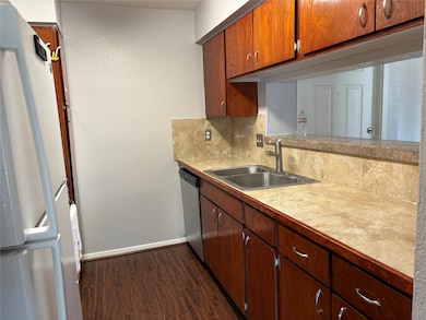 Kitchen offers Tile countertops.