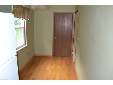 The eat-in kitchen has plenty of space for a table