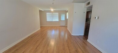 Hall featuring light wood-type flooring