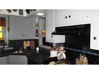Country charm with updated amenities.