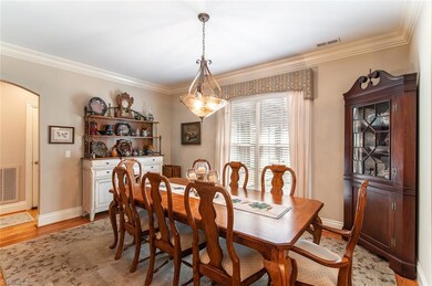 Dining room off of the foyer and open to the living room.