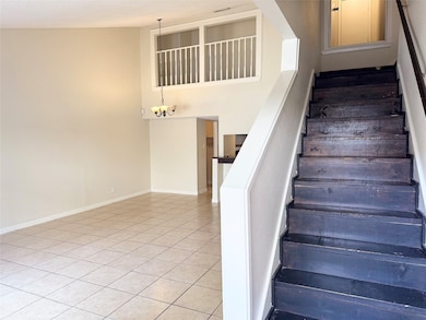 Upon entry, you’re welcomed by a staircase that le
