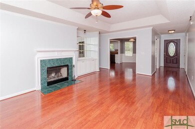 Tray ceilings and built in display area.