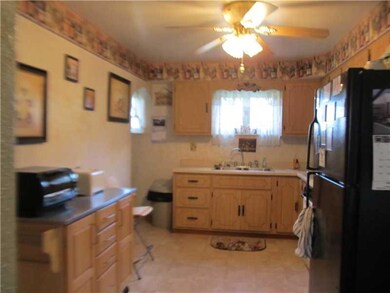 Kitchen. 14  x 09  kitchen, refrigerator and gas s