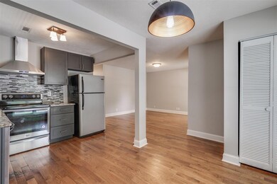 The eating area beside the kitchen can accommodate a modest dining table. The washer dryer hookup located in the closet on right.