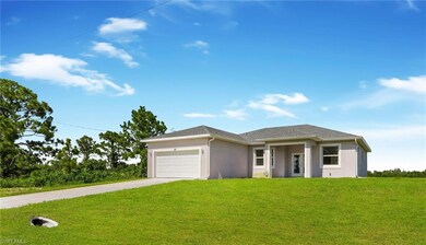 827 Naples Ave S, Lehigh Acres, FL 33974 - photo 4