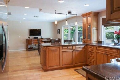 Kitchen is open to the family room with dual pane 