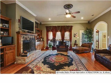Large Den with Fabulous Wood Floors, Fireplace and