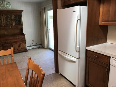 Custom Kitchen Opens to Dining Room