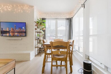 Dining space with wood finished floors