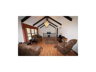 Great Room leads to finished lower level.  Room fo