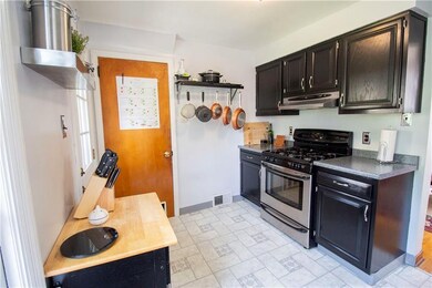 Kitchen with Shelving Rack for Pots and Pans