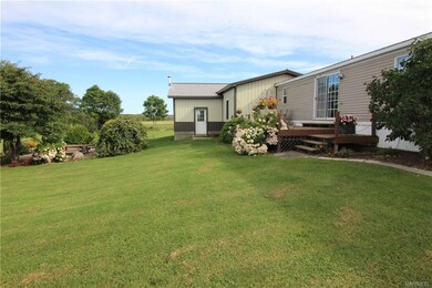 Beautiful gardens surround this entire home with l