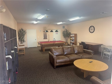 Game room featuring carpet flooring and billiards