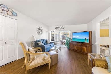 Living room featuring wood finished floors