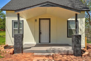 Property entrance with roof with shingles