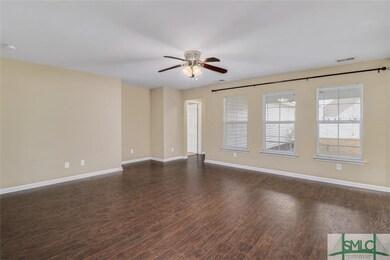 LIVING ROOM HAS NEW WOOD FLOORING, NEUTRAL PAINT A