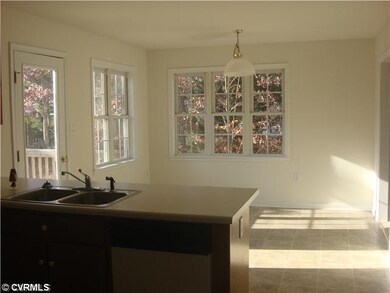 Kitchen - Bar area with double sink.  Dishwasher. 