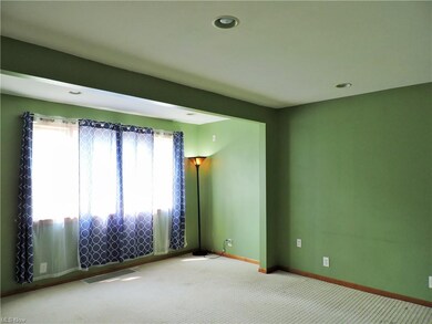 Large picture window in living room.