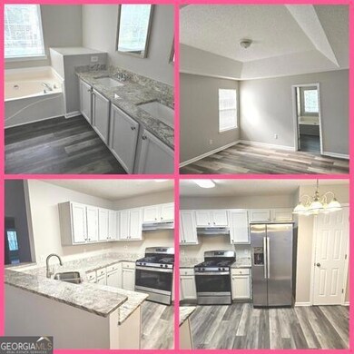 Kitchen with appliances with stainless steel  appliances.