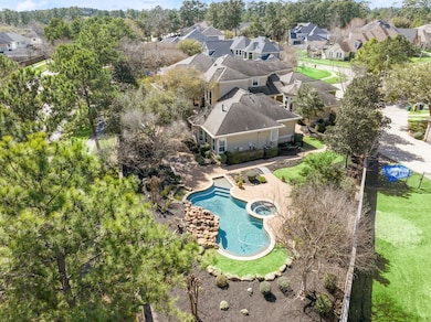 Stunning aerial view of a beautifully landscaped b