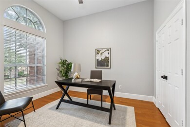 This well-appointed home office features a conveni