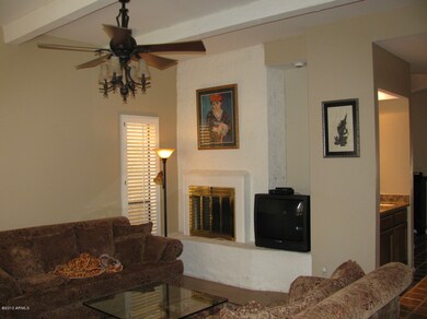 Living Room with Fireplace and Wet Bat