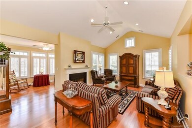 Vaulted Great Room opens into a Bright Sun room (P