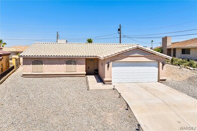 Single story home with a garage