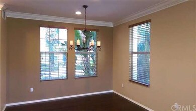 Formal dining room with crown molding and recessed