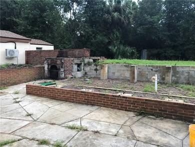 BACK PATIO WITH RAISED GARDEN